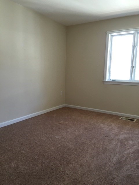 66 St James Street, Unit 209 Boston, MA 02119 - Photo 17 of 20 an empty room with a window