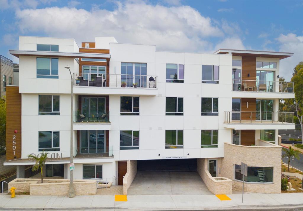 2501 State Street Carlsbad, CA 92008 - Photo 32 of 32 a front view of a building with glass windows and glass windows