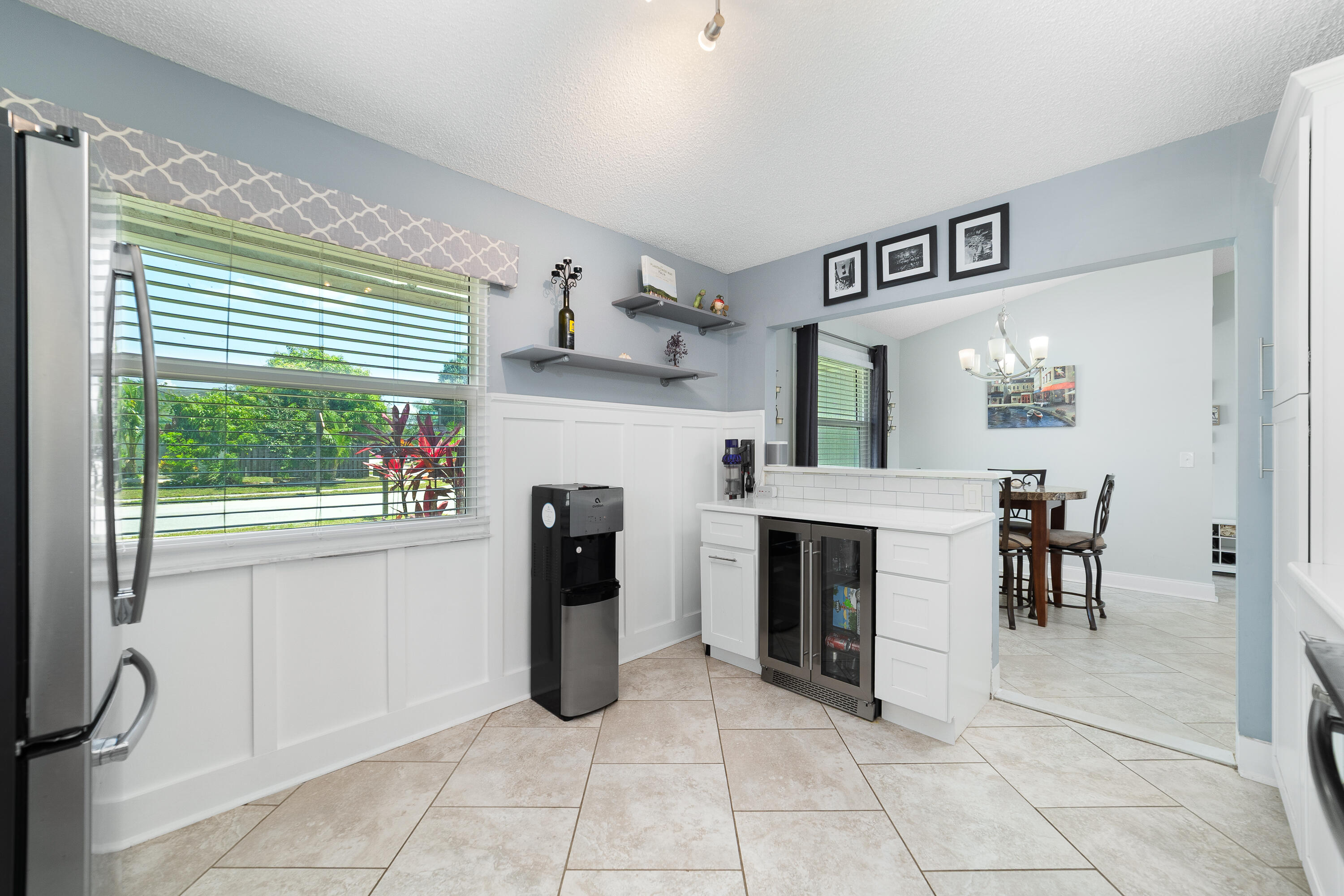142 Timberline Drive Jupiter, FL 33458 - Photo 17 of 35 a view of a livingroom with furniture and a fireplace