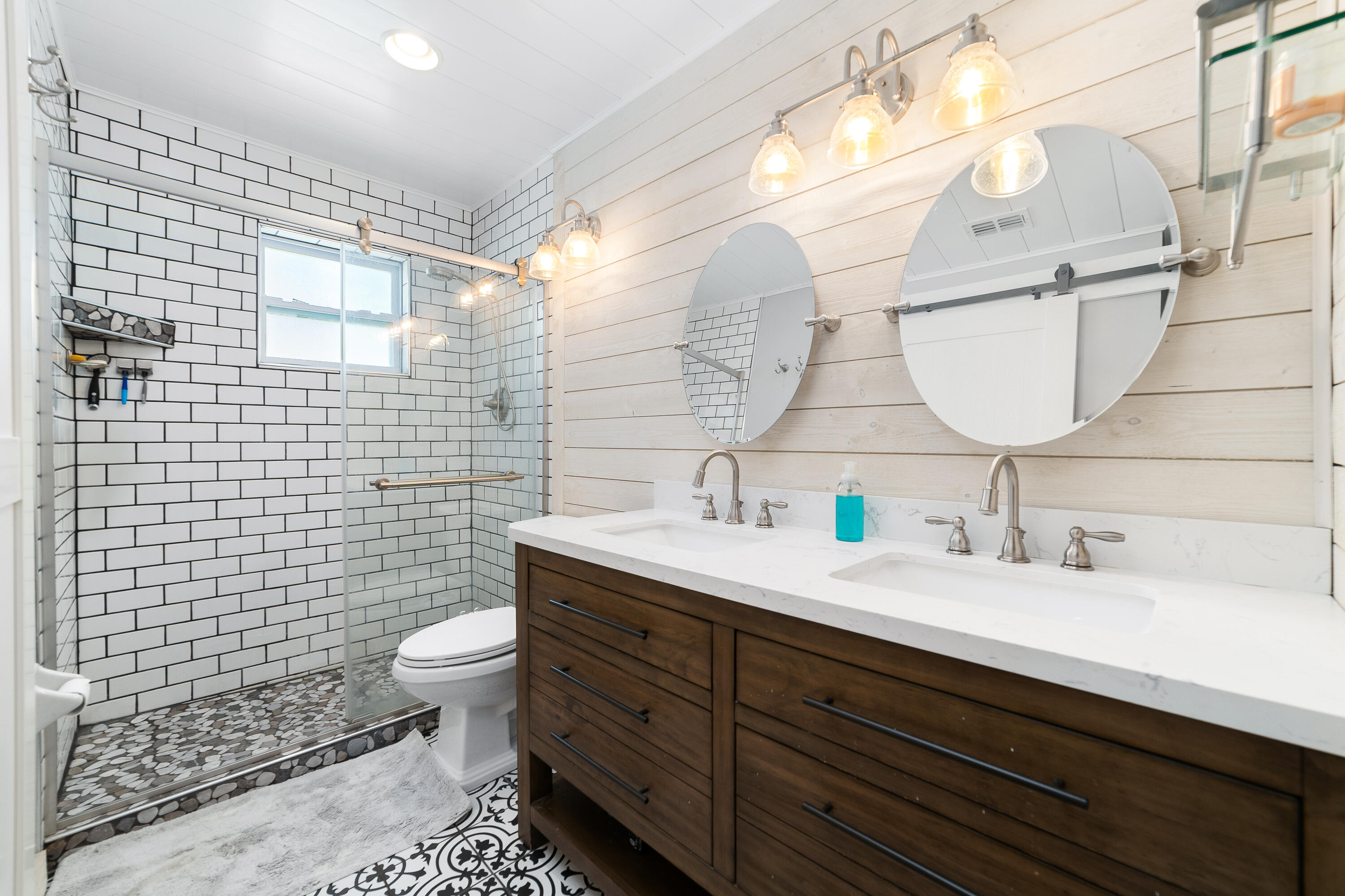 142 Timberline Drive Jupiter, FL 33458 - Photo 20 of 35 a bathroom with a sink toilet and shower