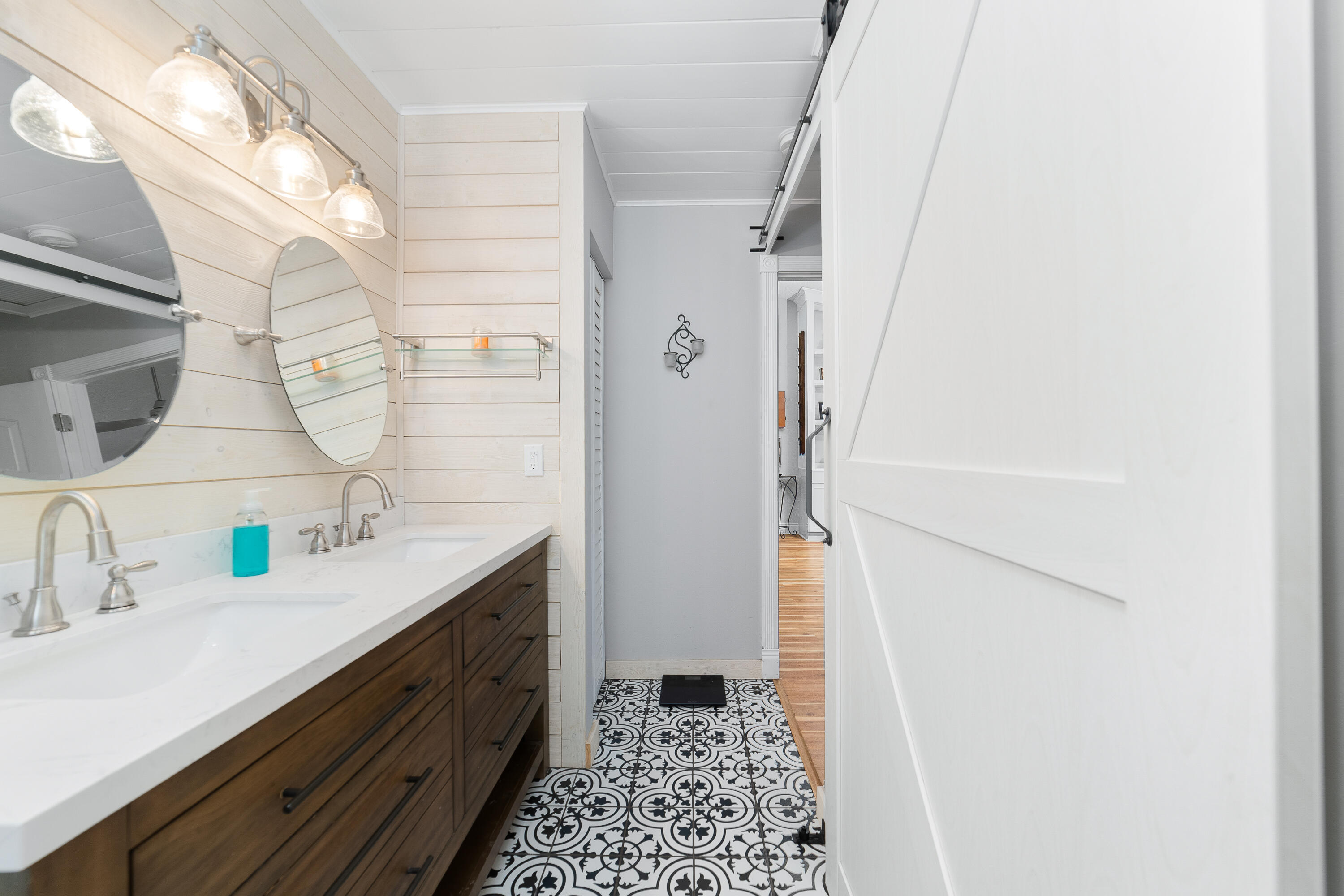 142 Timberline Drive Jupiter, FL 33458 - Photo 22 of 35 a bathroom with a double vanity sink and mirror