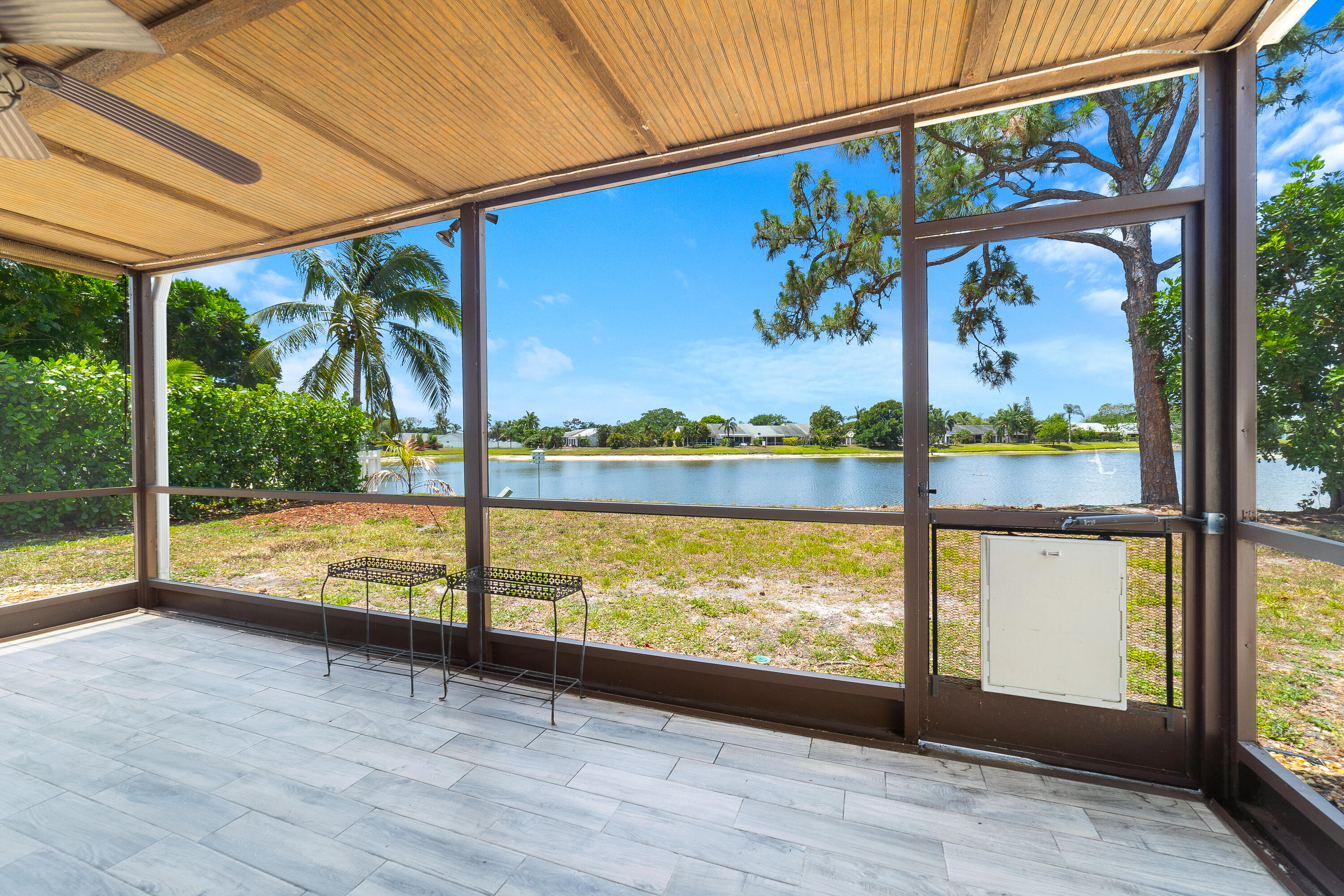 142 Timberline Drive Jupiter, FL 33458 - Photo 7 of 35 a view of swimming pool with a patio