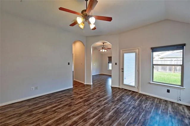 a view of gallery with wooden floor