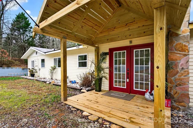 a view of a backyard with a patio