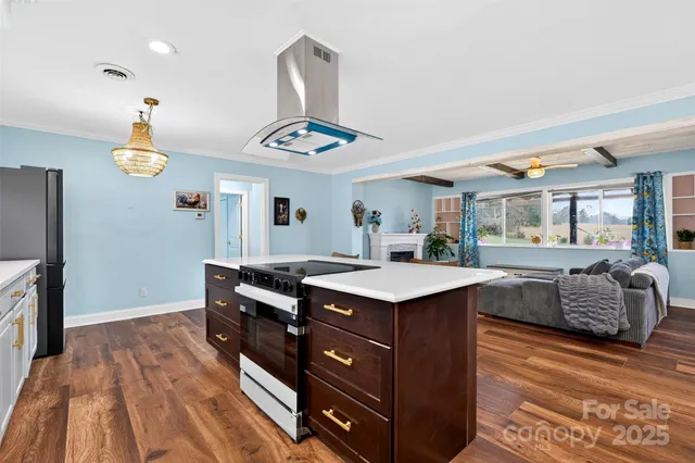 a kitchen with a stove and a refrigerator