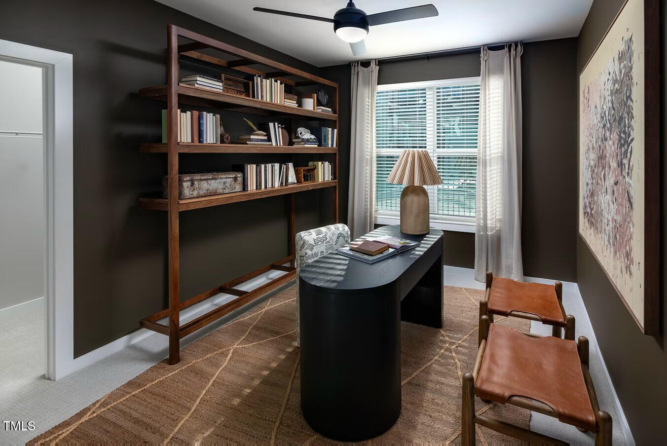 821 Hanbury Way, Unit A1 1 Raleigh, NC 27607 - Photo 14 of 43 a view of a workspace with furniture and a window