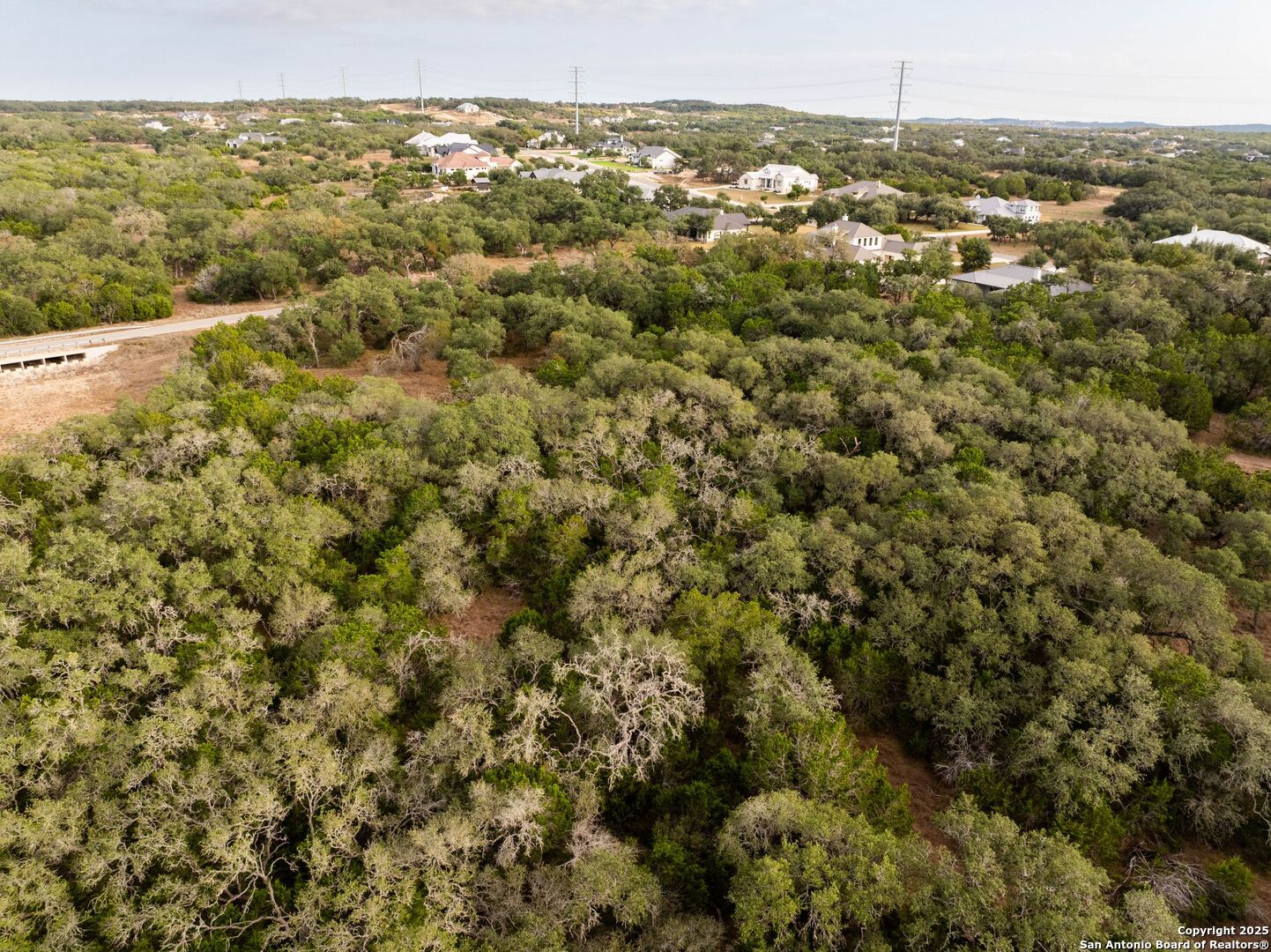 34815 Last Stage Way Bulverde, TX 78163 - Photo 15 of 26 an aerial view of residential houses with outdoor space