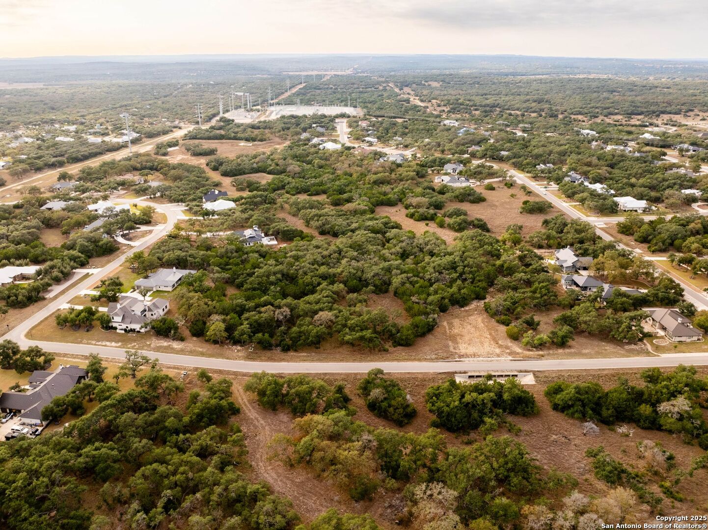 34815 Last Stage Way Bulverde, TX 78163 - Photo 2 of 26 an aerial view of residential houses with outdoor space