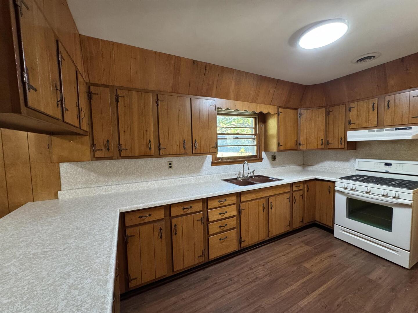 3536 West Grange Hall Road Murphysboro, IL 62966 - Photo 11 of 40 a kitchen with wooden cabinets and a sink