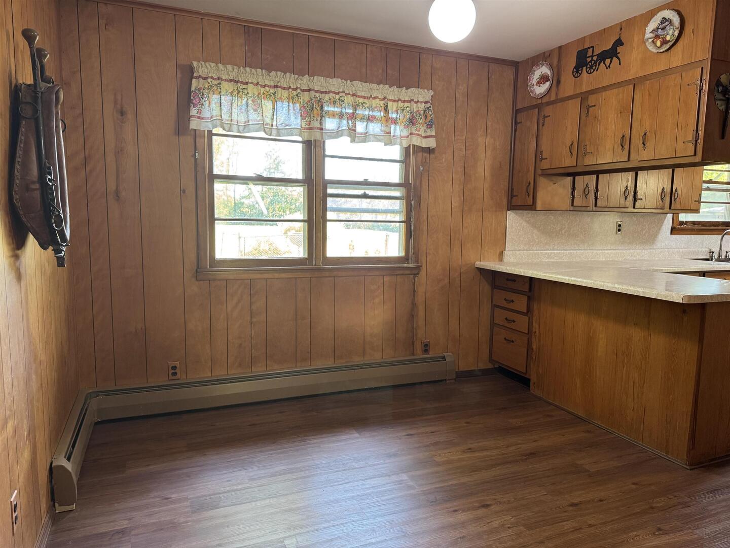 3536 West Grange Hall Road Murphysboro, IL 62966 - Photo 16 of 40 a view of an empty room with a window and wooden floor