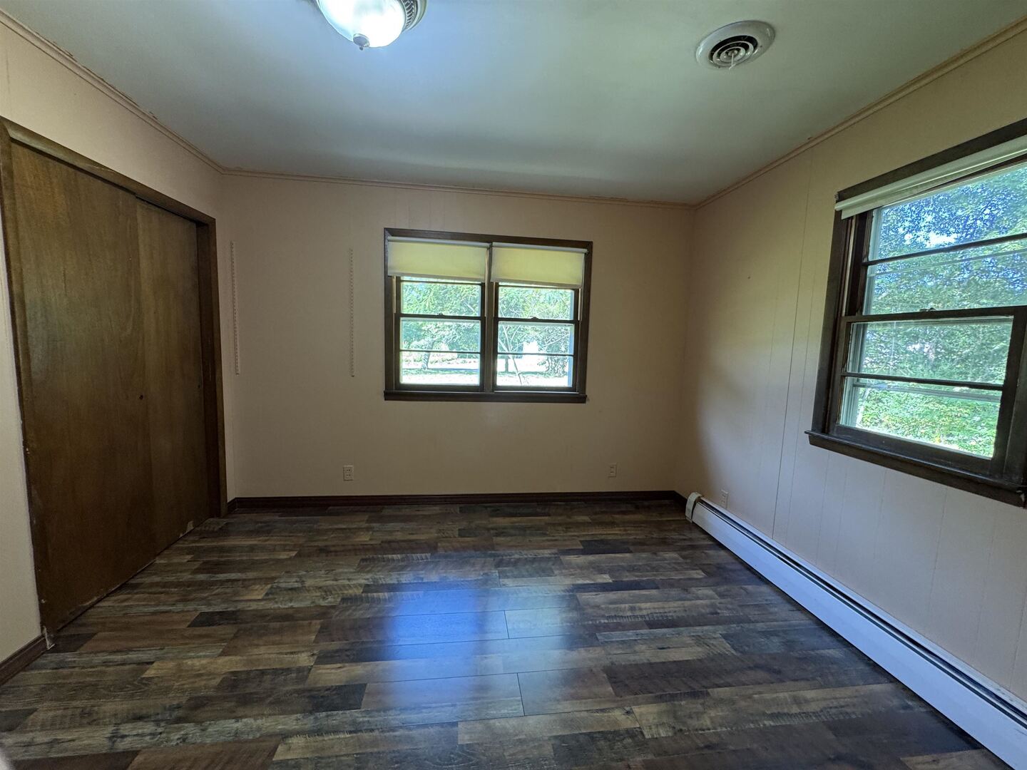 3536 West Grange Hall Road Murphysboro, IL 62966 - Photo 18 of 40 a view of an empty room with wooden floor and a window