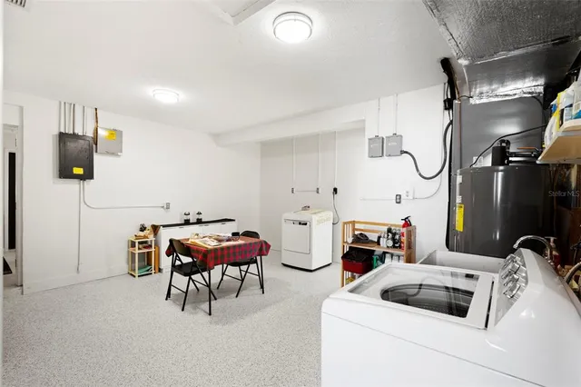 a utility room with dryer and washer