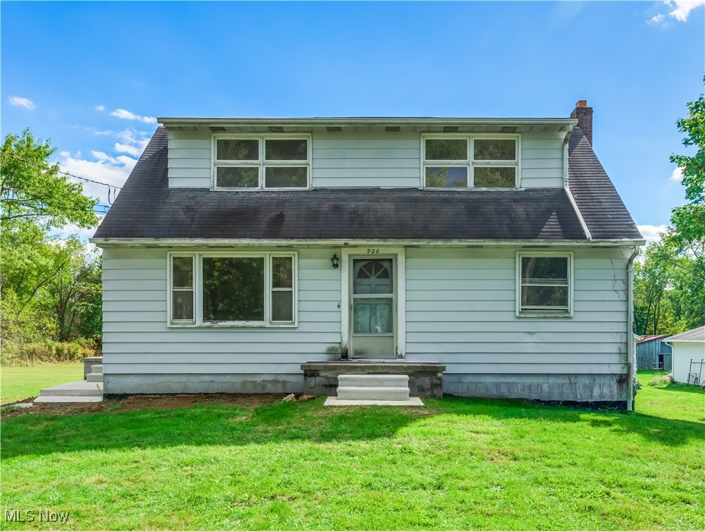 926 Alfred Road Akron, OH 44306 - Photo 1 of 14 Rear view of property with a lawn