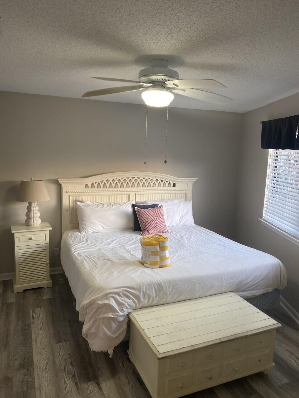285 Payne Street, Unit 4B Miramar Beach, FL 32550 - Photo 6 of 12 a bedroom with a bed and window