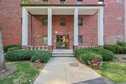 a front view of a house with a porch