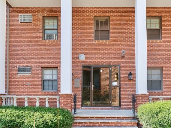 16 Winter Street, Unit 43B Waltham, MA 02451 - Photo 2 of 12 a view of a brick house with front door