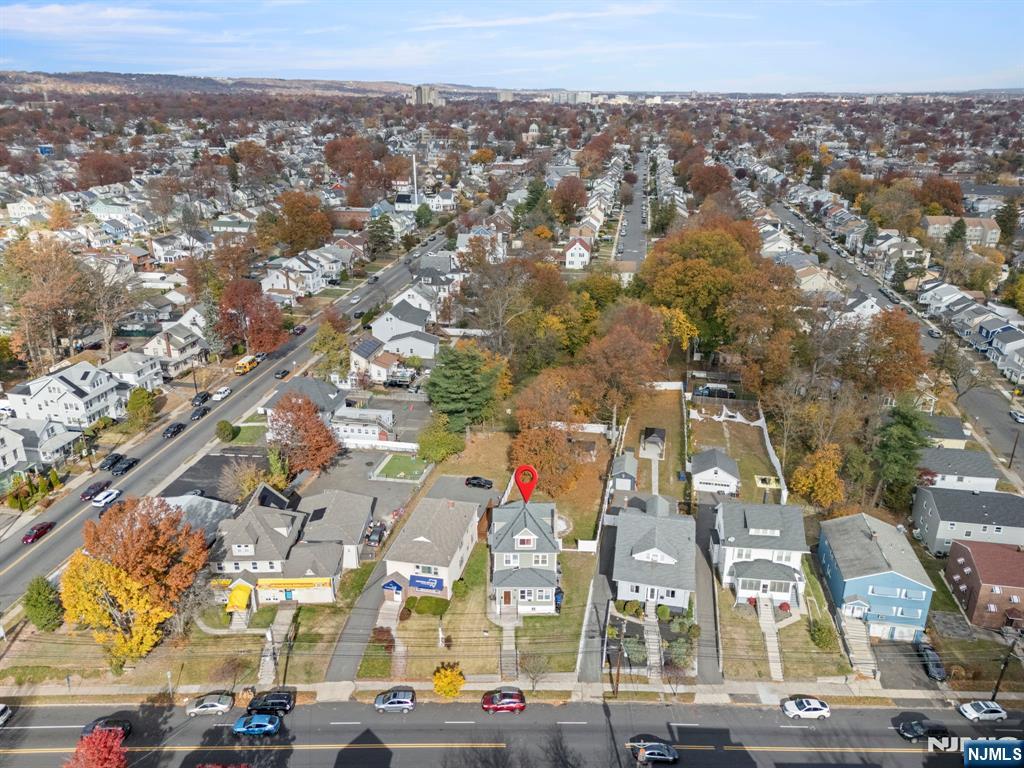 1373 Clinton Avenue Irvington, NJ 07111 - Photo 1 of 6 an aerial view of residential houses with outdoor space