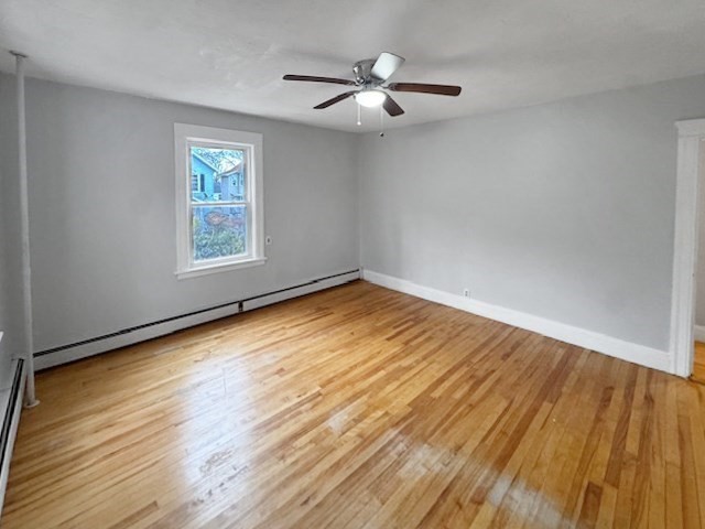80 Delmont Avenue Worcester, MA 01604 - Photo 15 of 35 wooden floor in an empty room with a window