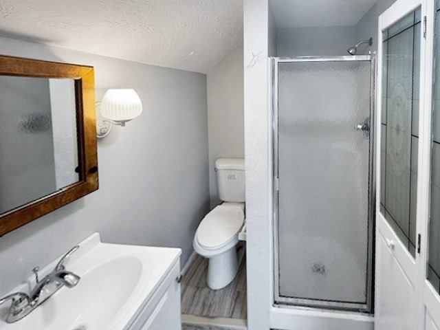 80 Delmont Avenue Worcester, MA 01604 - Photo 32 of 35 a white toilet sitting next to a bathroom sink