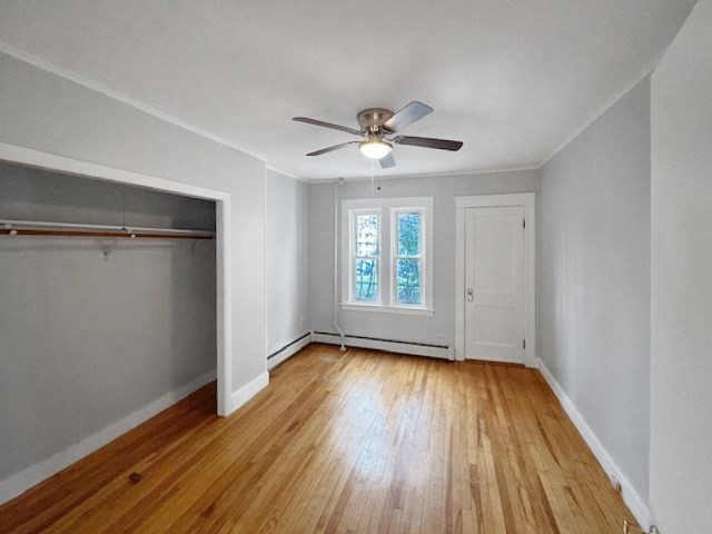 80 Delmont Avenue Worcester, MA 01604 - Photo 9 of 35 a view of empty room with wooden floor and fan
