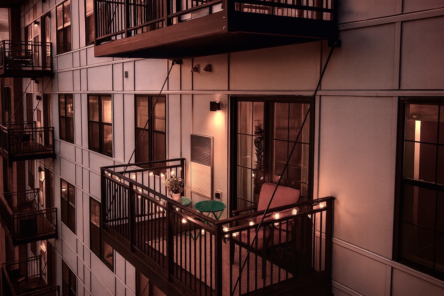 250 McHenry Road, Unit C1 Buffalo Grove, IL 60089 - Photo 13 of 35 a view of a balcony with furniture and umbrella