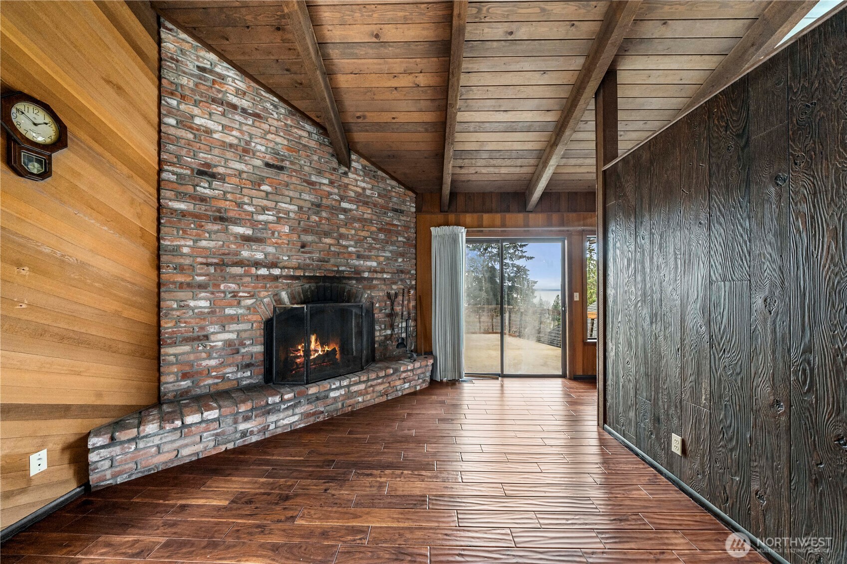 2617 Southwest 163rd Street Burien, WA 98166 - Photo 15 of 31 a living room with furniture and a fireplace