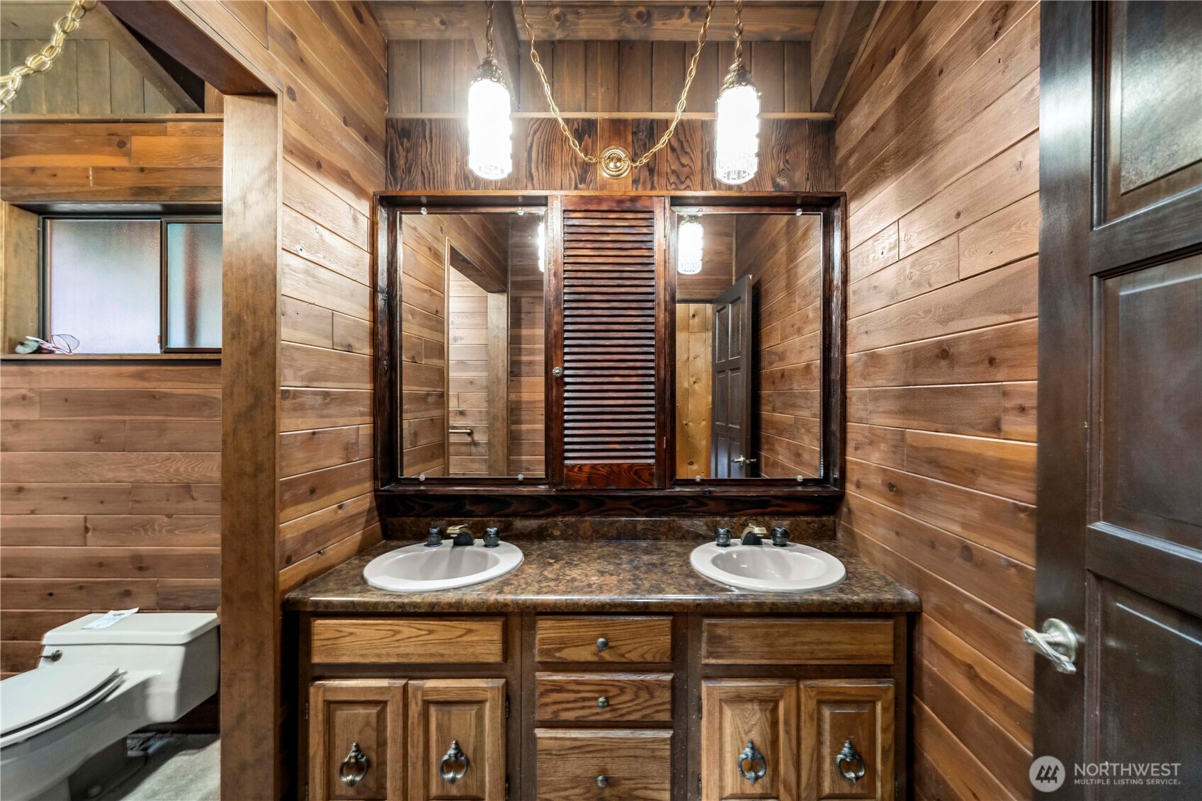 2617 Southwest 163rd Street Burien, WA 98166 - Photo 18 of 31 a bathroom with a granite countertop sink and a mirror