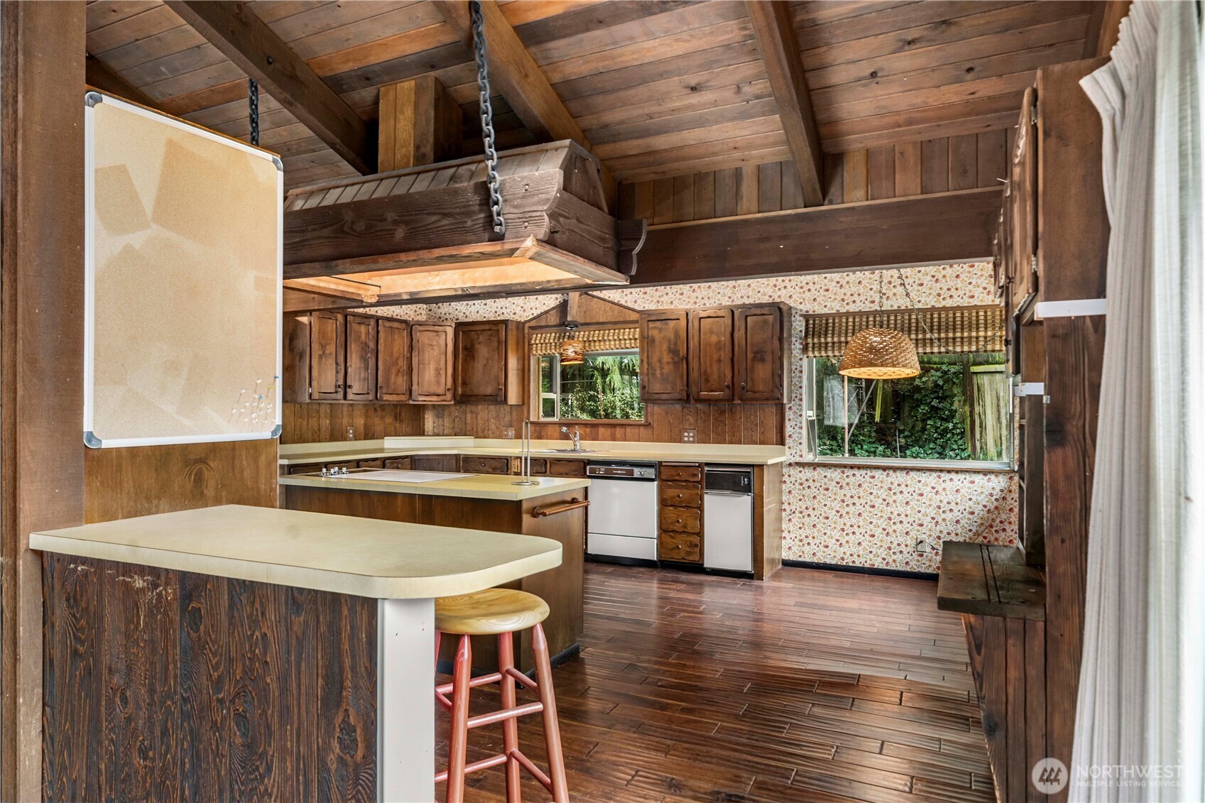2617 Southwest 163rd Street Burien, WA 98166 - Photo 10 of 31 a kitchen with stainless steel appliances granite countertop a stove and a refrigerator