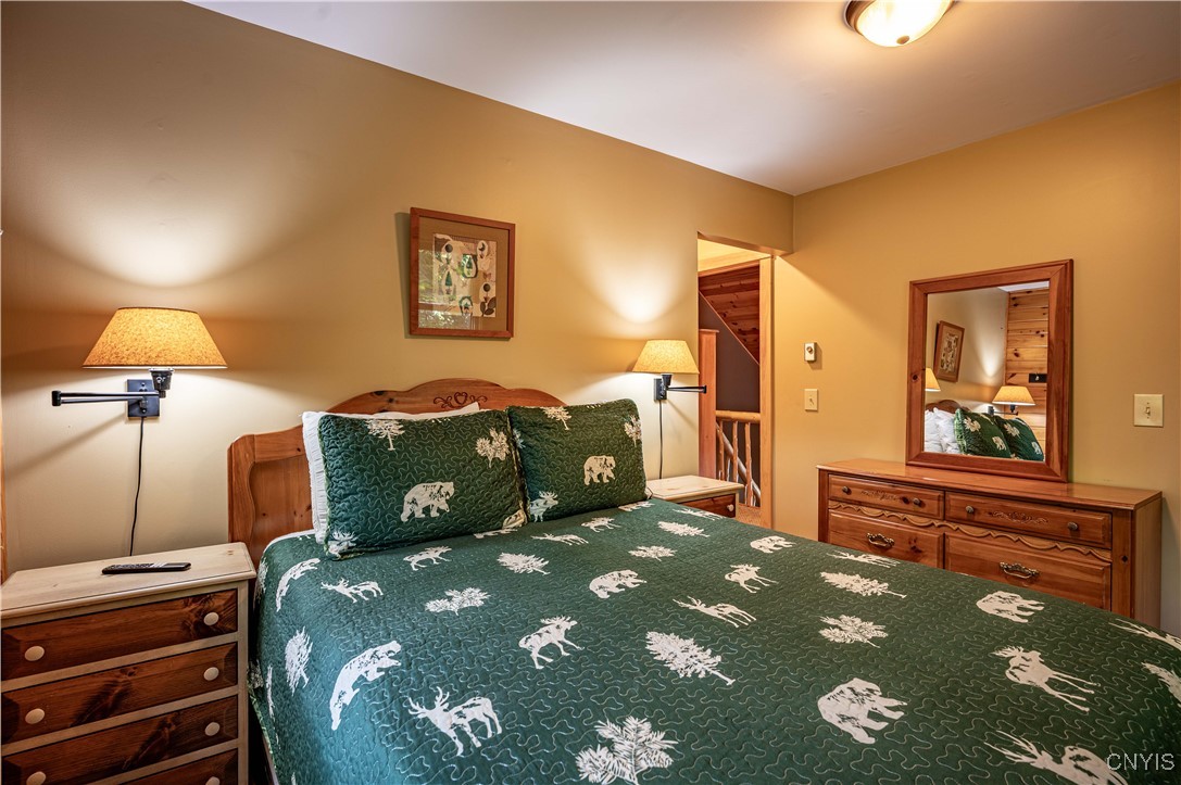 112 Holiday Drive Webb, NY 13420 - Photo 11 of 29 114 Primary Bedroom