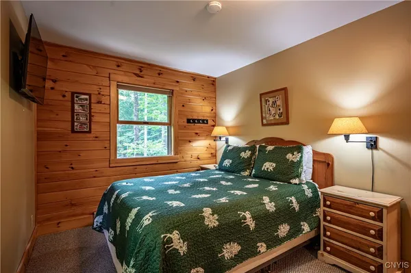 $1,299,900 | 112 Holiday Drive, Webb, NY 13420