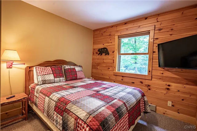 $1,299,900 | 112 Holiday Drive, Webb, NY 13420