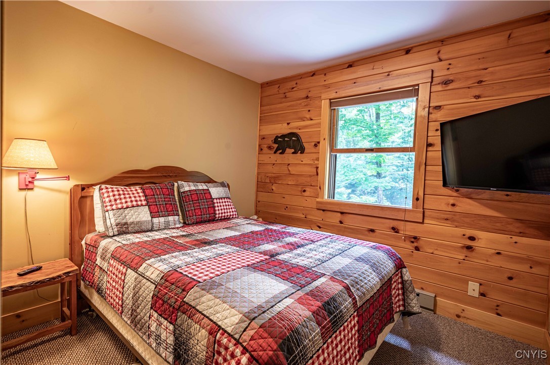 112 Holiday Drive Webb, NY 13420 - Photo 14 of 29 114 Upstairs Guest Bedroom