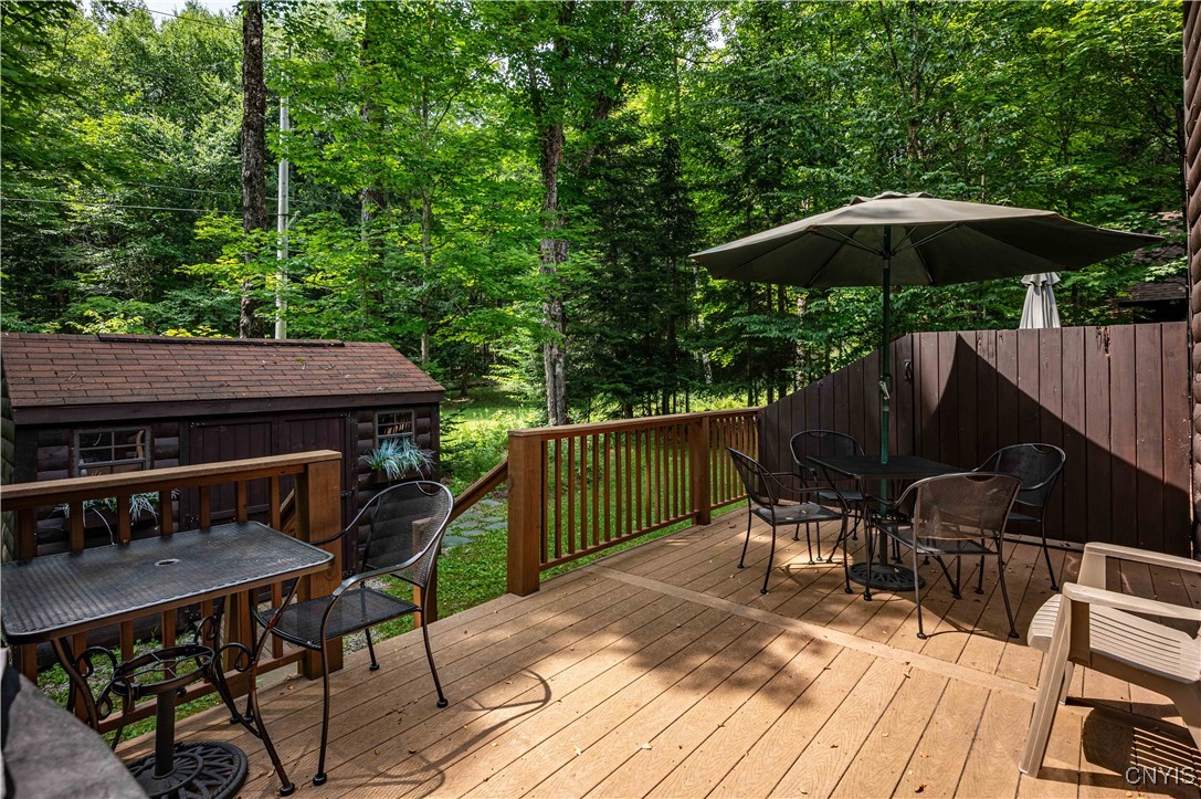 112 Holiday Drive Webb, NY 13420 - Photo 15 of 29 114 Back Patio