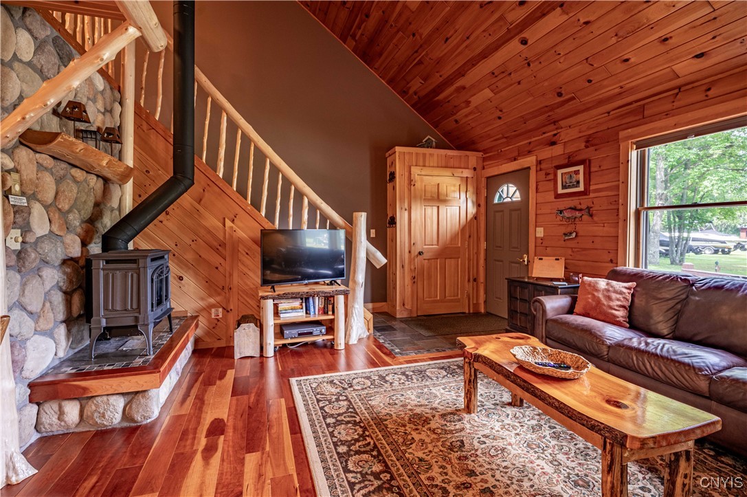 112 Holiday Drive Webb, NY 13420 - Photo 2 of 29 114 Great Room with Propane Fireplace