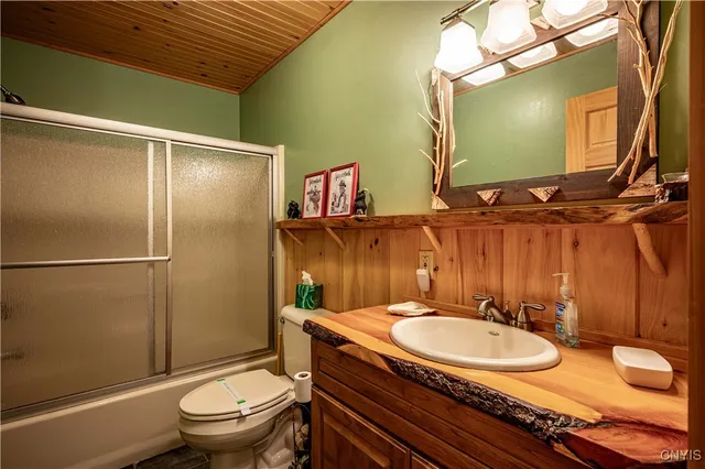 $1,299,900 | 112 Holiday Drive, Webb, NY 13420