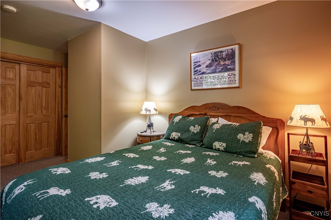 112 Holiday Drive Webb, NY 13420 - Photo 23 of 29 112 Primary Bedroom