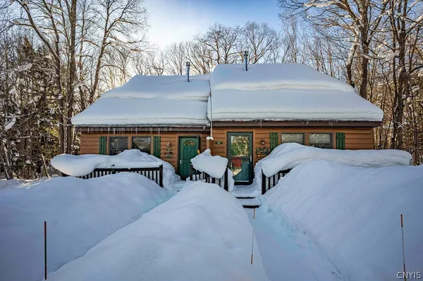 $1,299,900 | 112 Holiday Drive, Webb, NY 13420