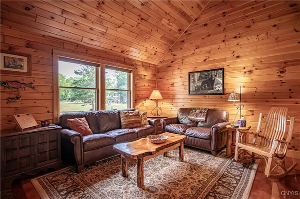 $1,299,900 | 112 Holiday Drive, Webb, NY 13420