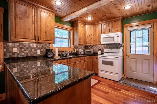 $1,299,900 | 112 Holiday Drive, Webb, NY 13420