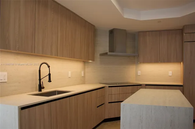 a kitchen with a sink and a cabinets