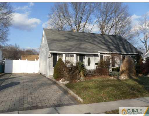 38 Parkerson Road Edison, NJ 08817 - Photo 1 of 8 a backyard of a house with yard and outdoor seating