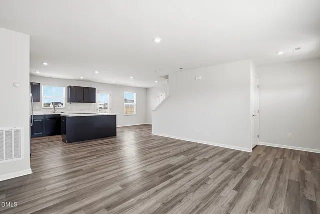 a view of kitchen with wooden floor