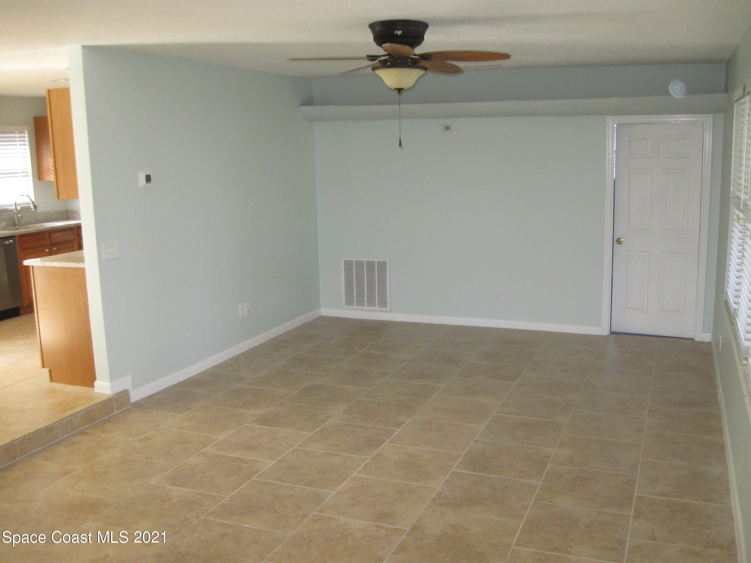 770 Sandgate Street Merritt Island, FL 32953 - Photo 13 of 22 a view of an empty room