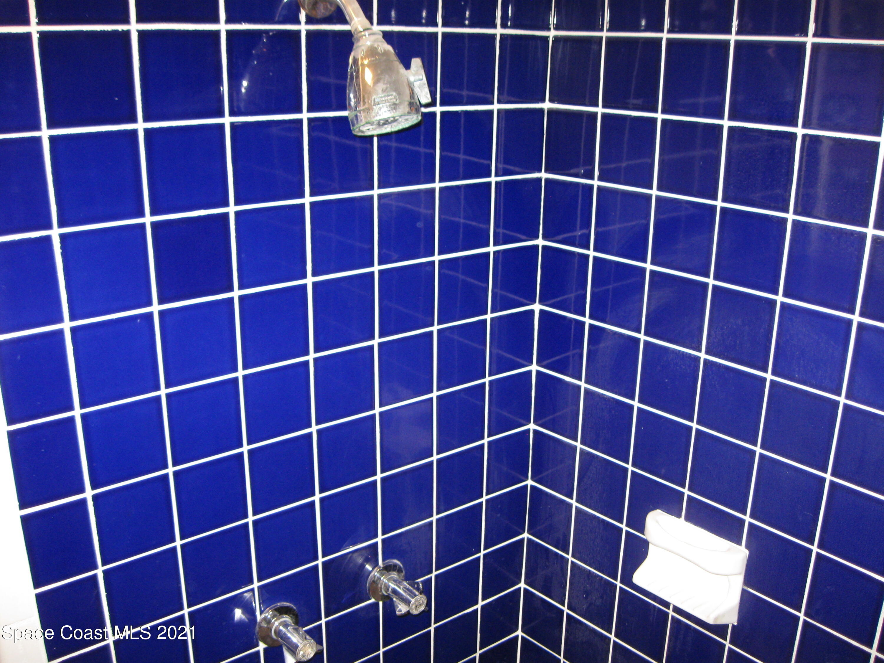 770 Sandgate Street Merritt Island, FL 32953 - Photo 10 of 22 a view of a chair and a window