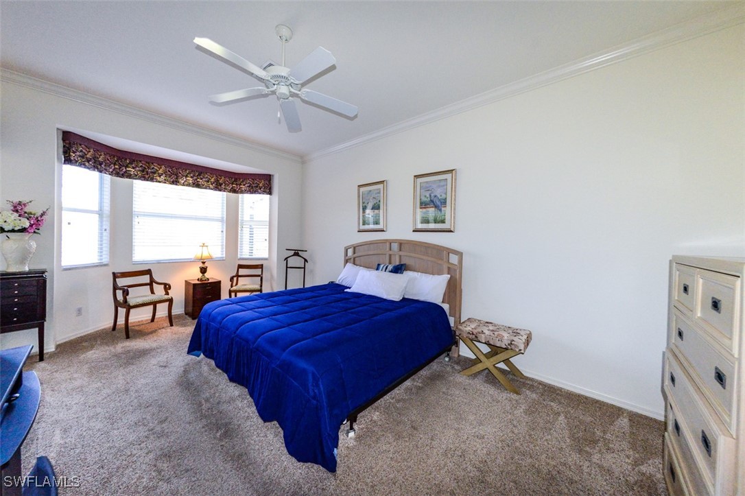 11142 Wine Palm Road Fort Myers, FL 33966 - Photo 19 of 42 a bed room with a bed and a window