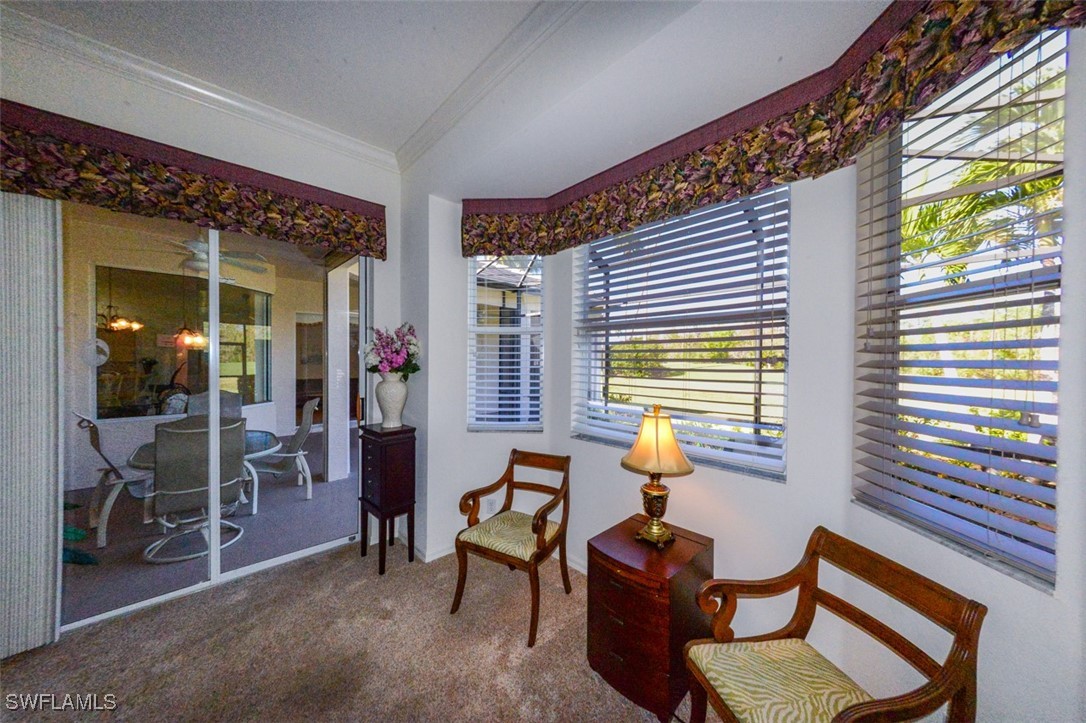 11142 Wine Palm Road Fort Myers, FL 33966 - Photo 22 of 42 a living room with furniture and a window