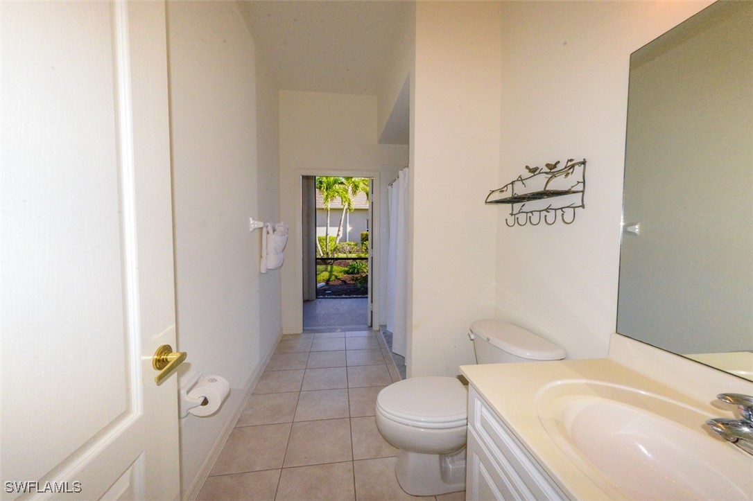 11142 Wine Palm Road Fort Myers, FL 33966 - Photo 33 of 42 a bathroom with a sink and toilet