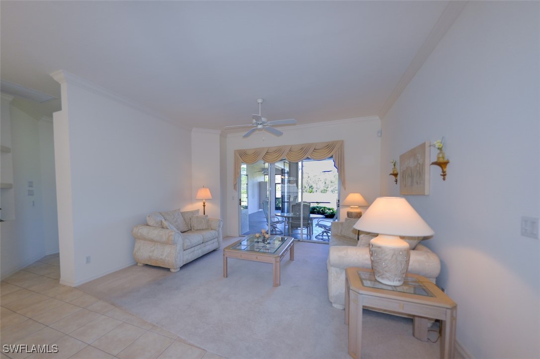 11142 Wine Palm Road Fort Myers, FL 33966 - Photo 6 of 42 a living room with furniture and white walls