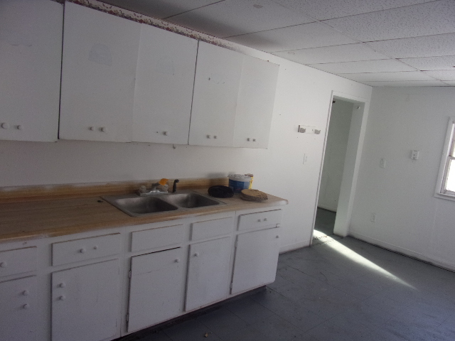 104 Algonquin Road Marquette Heights, IL 61554 - Photo 12 of 12 a hallway with cabinets