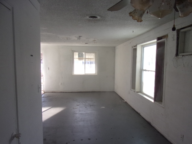 104 Algonquin Road Marquette Heights, IL 61554 - Photo 6 of 12 an empty room with windows